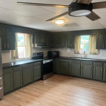 Factory‑finish cabinet painting service in Northern Virginia kitchen with smooth durable coating