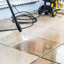 Power washing service cleaning home exterior